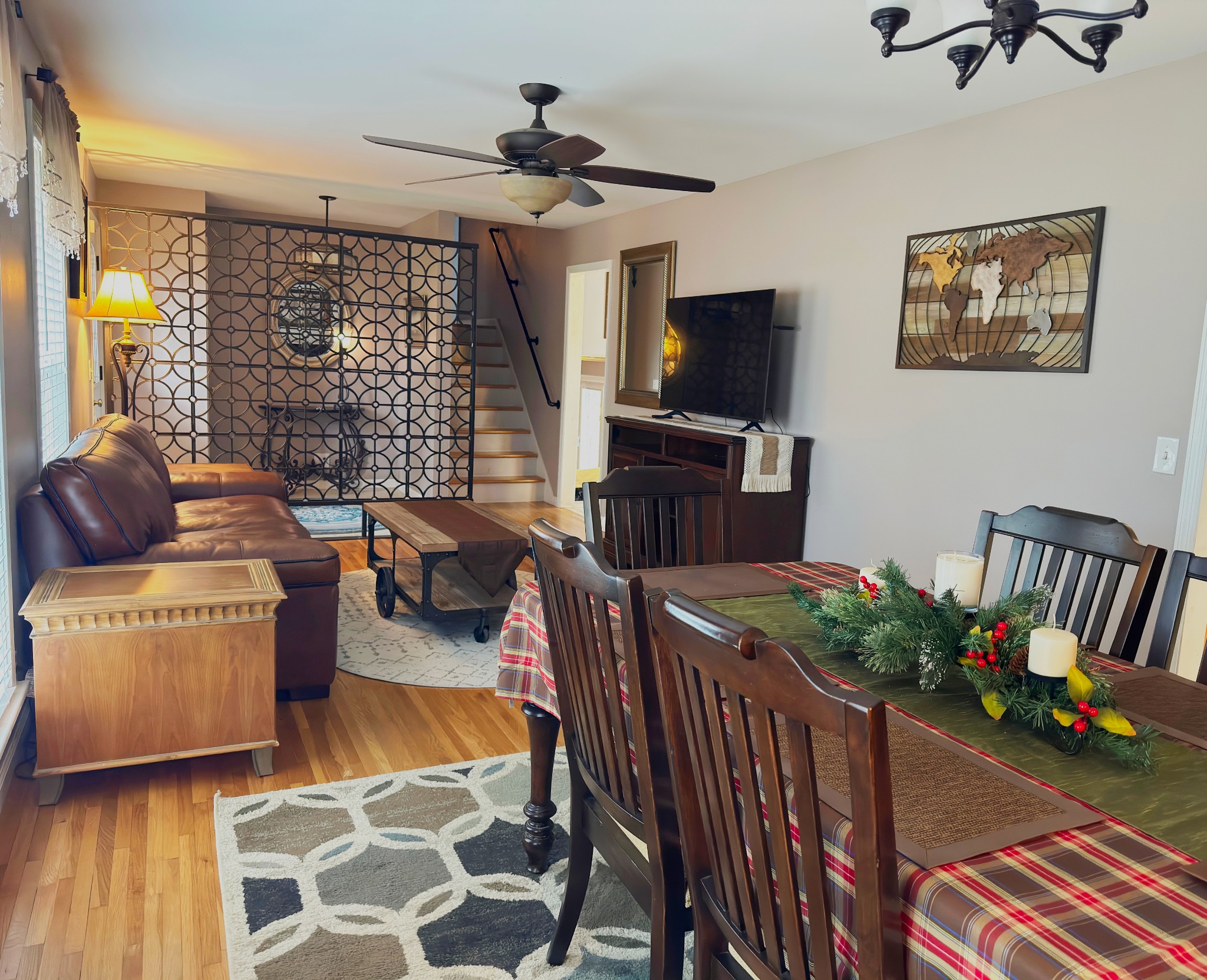 303 Raintree Drive Hendersonville, TN 37075 - Photo 16 of 36 a living room with furniture and a flat screen tv