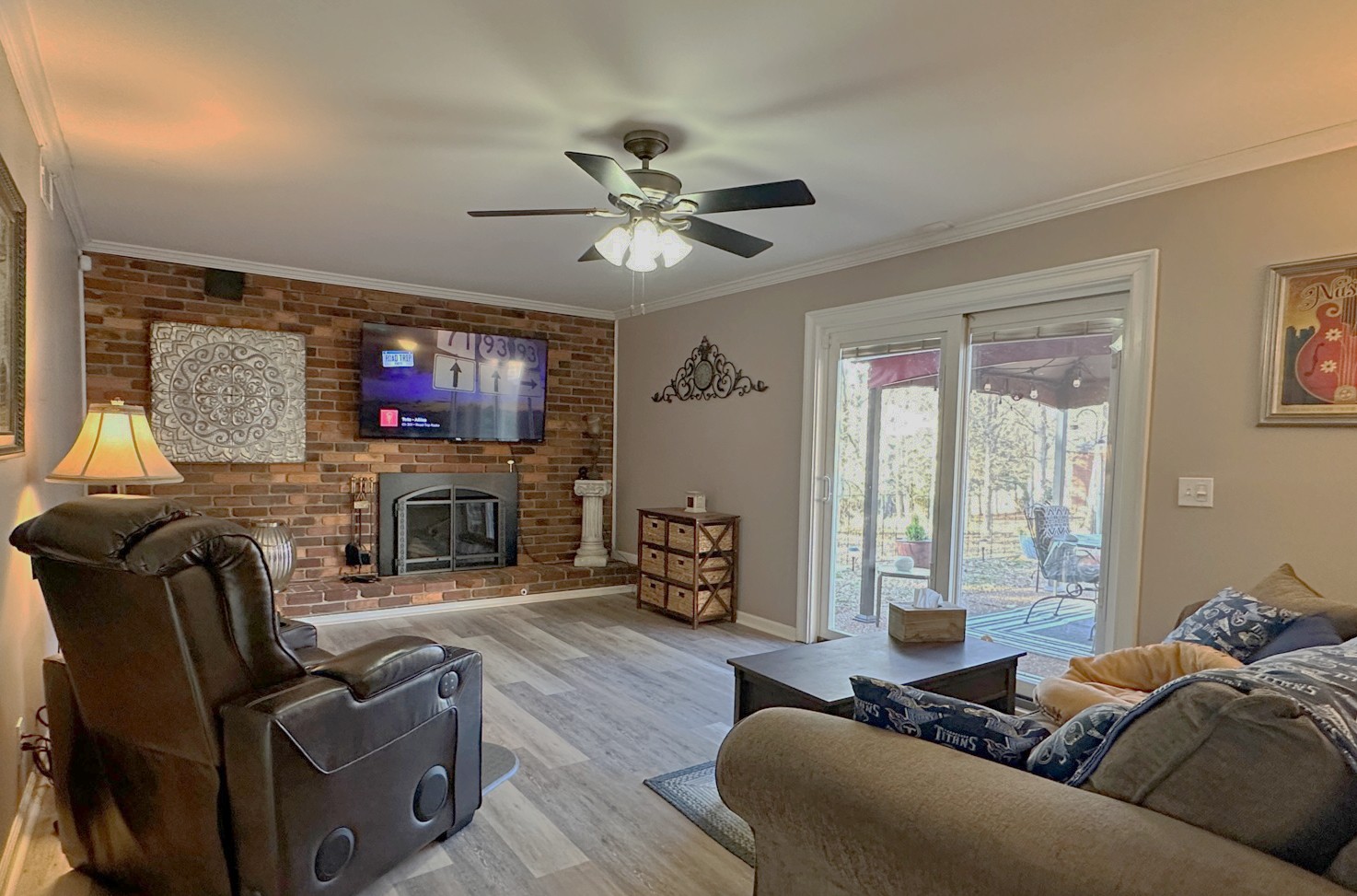 303 Raintree Drive Hendersonville, TN 37075 - Photo 23 of 36 a living room with fireplace furniture and a flat screen tv