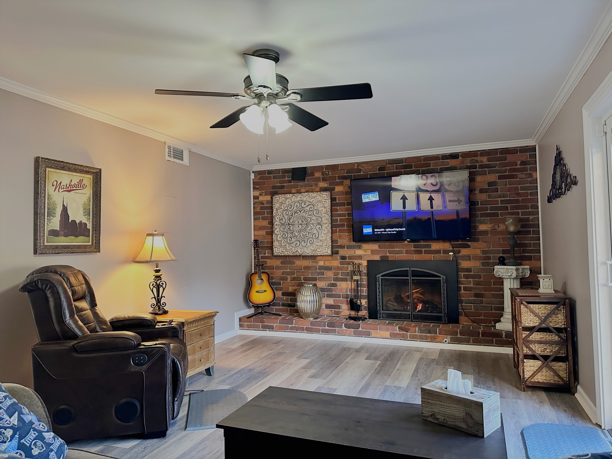 303 Raintree Drive Hendersonville, TN 37075 - Photo 24 of 36 a living room with furniture and a fireplace
