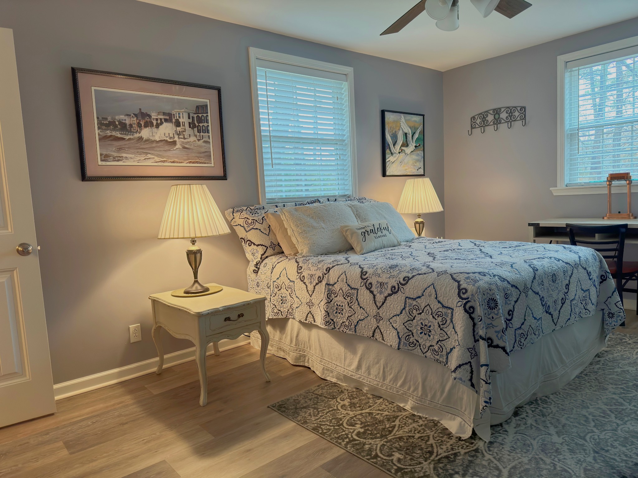 303 Raintree Drive Hendersonville, TN 37075 - Photo 26 of 36 a bedroom with a bed and a lamp on table