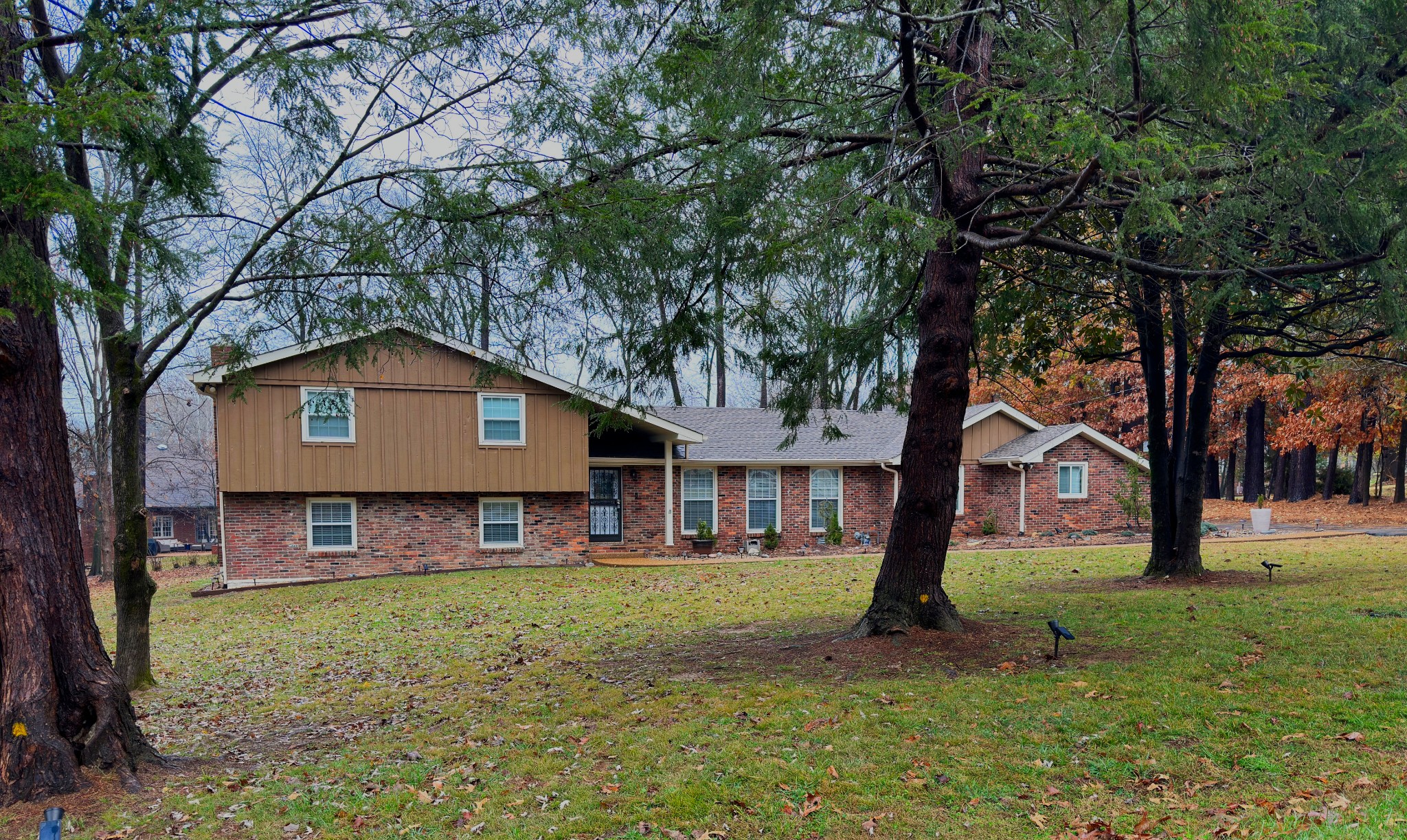 303 Raintree Drive Hendersonville, TN 37075 - Photo 36 of 36 a front view of a house with a yard