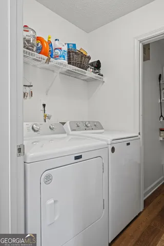 a utility room with dryer and washer