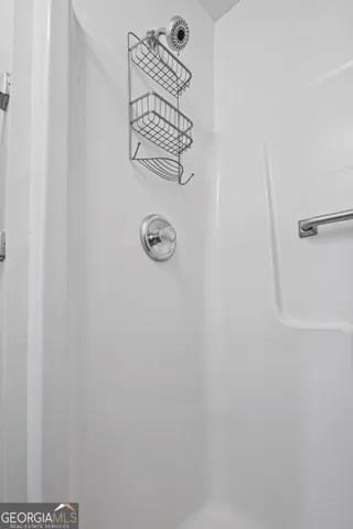 a view of a room with rack on the wall