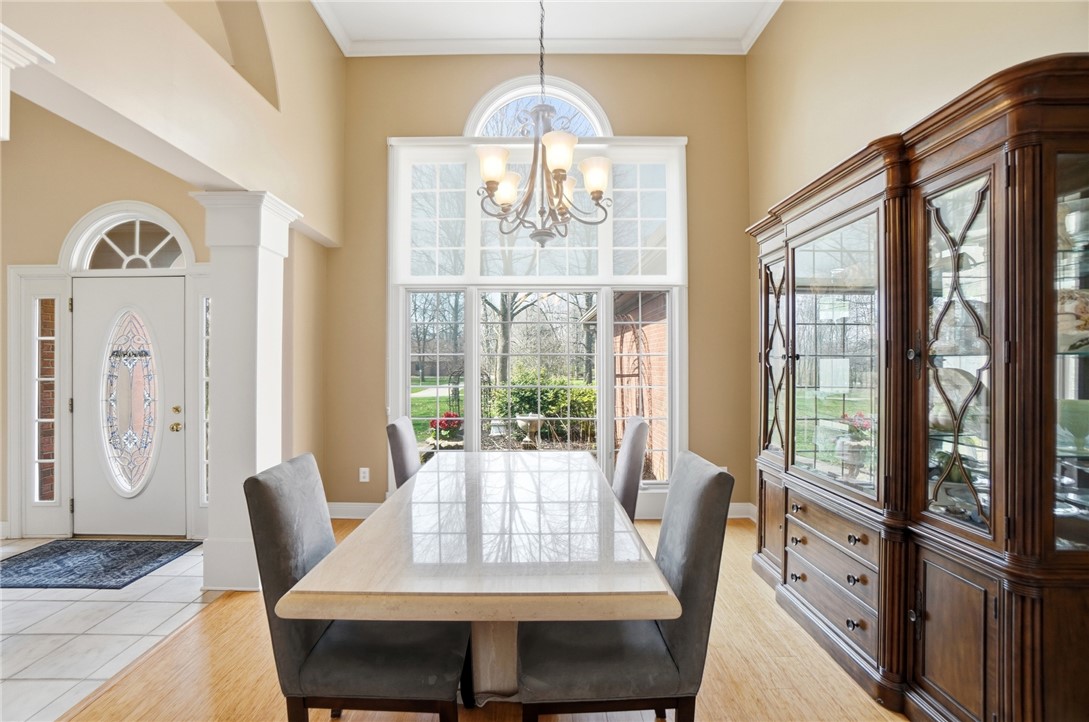 472 Timber Walk Court Springboro, OH 45066 - Photo 14 of 86 This elegant dining room features high ceilings, hardwood flooring, and abundant natural light.