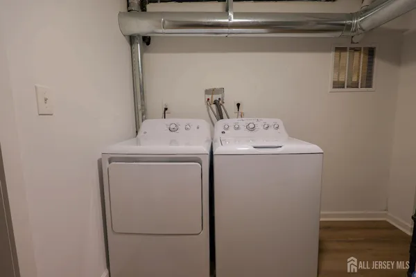 a utility room with dryer and washer