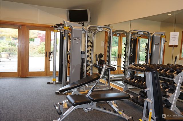 a view of a room with gym equipment