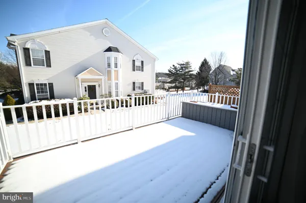 a view of a house with a deck