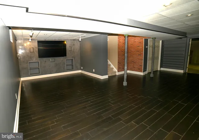 a view of gallery with windows