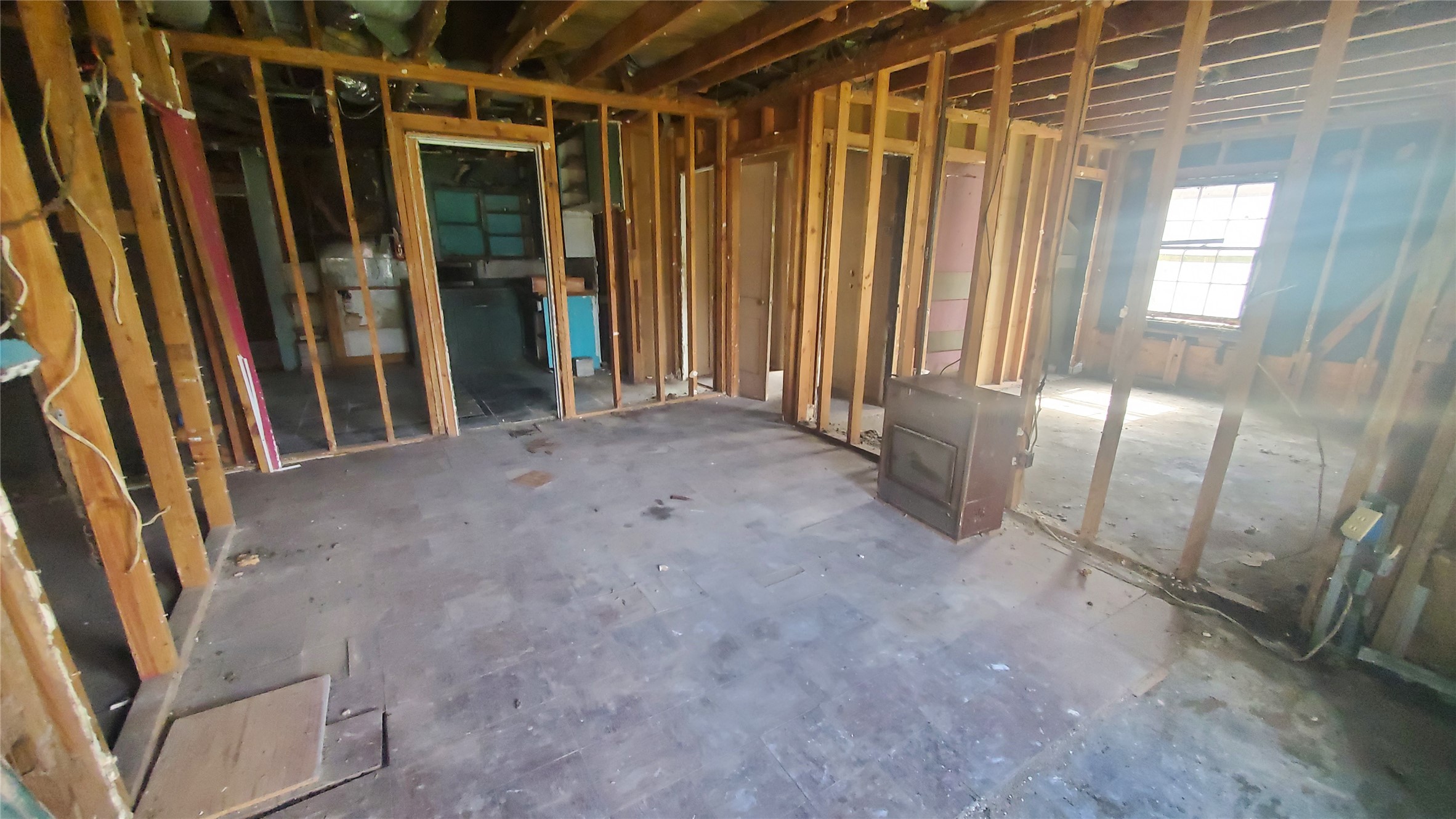 4821 Burma Road Houston, TX 77033 - Photo 21 of 23 a view of an empty room with a window