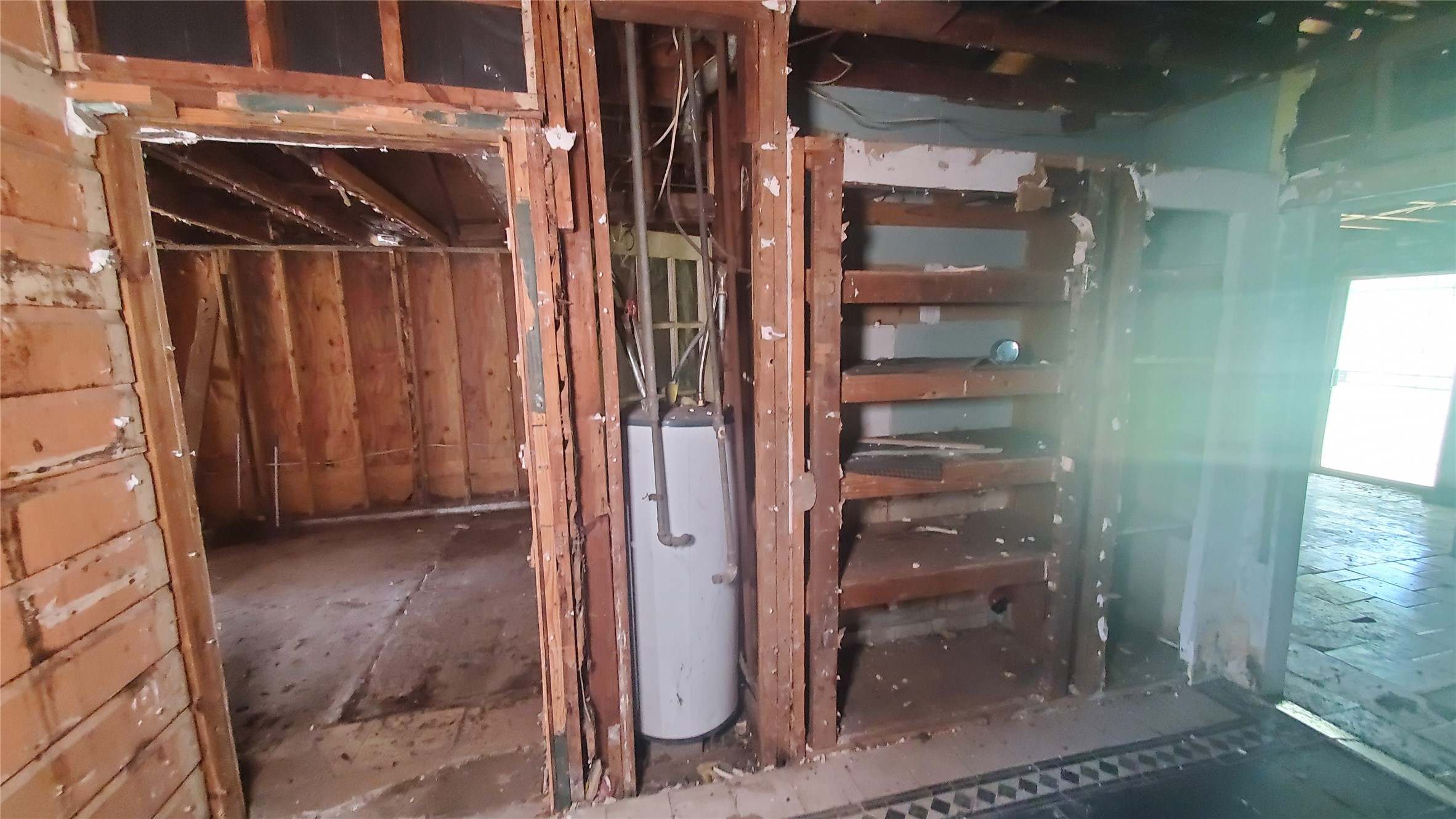 4821 Burma Road Houston, TX 77033 - Photo 23 of 23 a view of storage and utility room