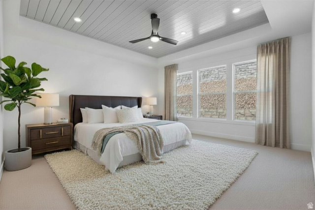 710 East Mountain Road North Ogden, UT 84414 - Photo 12 of 36 Enhanced staged photo, Bedroom featuring light colored carpet, a wooden tray ceiling, a ceiling fan, and recessed lighting