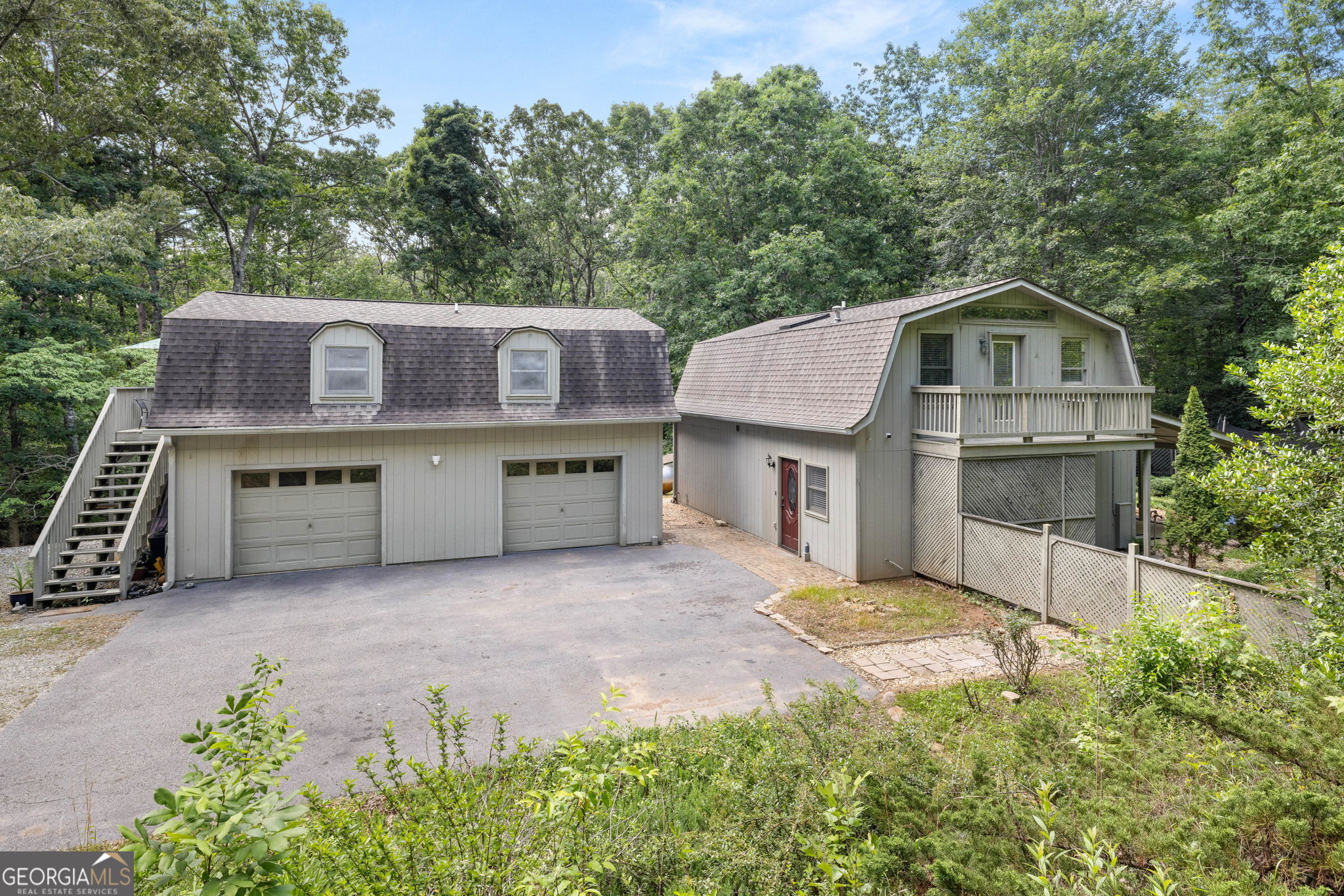 115 Rose Road Cleveland, GA 30528 - Photo 1 of 1 a front view of a house with a yard and garage
