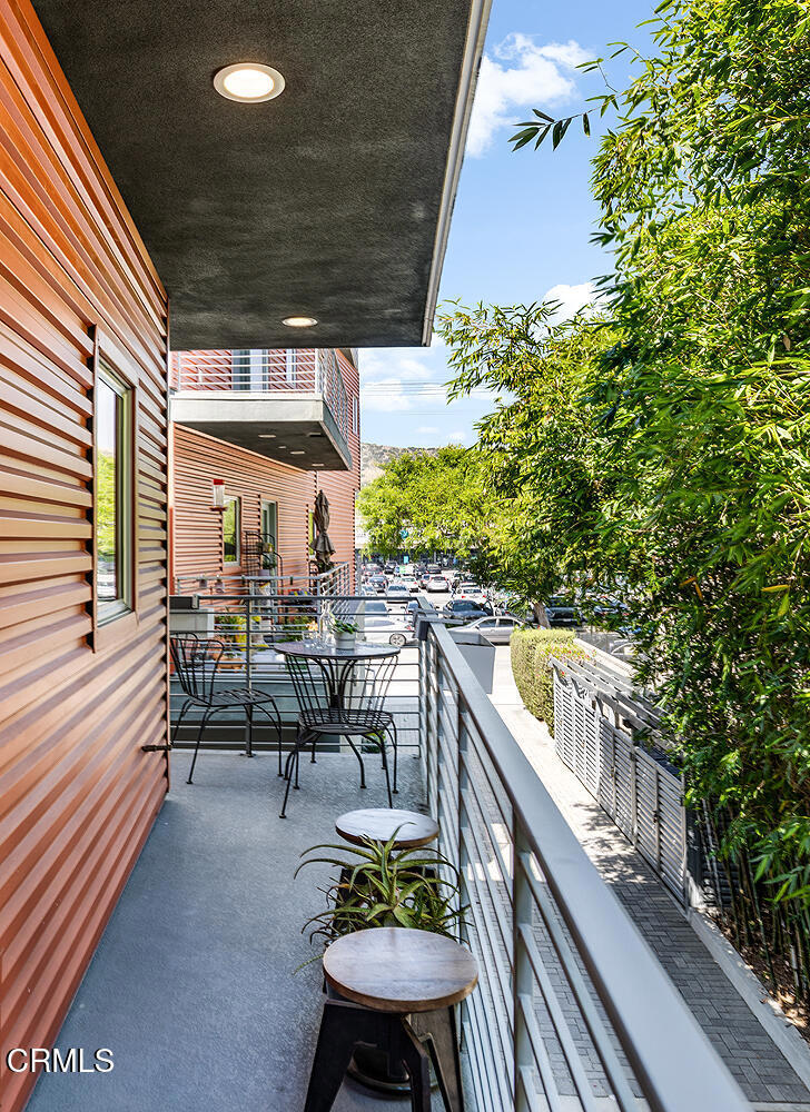 2222 Strata Lane Los Angeles, CA 90041 - Photo 17 of 31 a balcony with furniture and a potted plant
