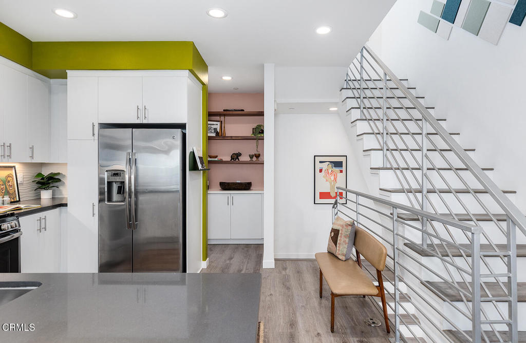 2222 Strata Lane Los Angeles, CA 90041 - Photo 18 of 31 a kitchen with granite countertop a refrigerator and a stove top oven