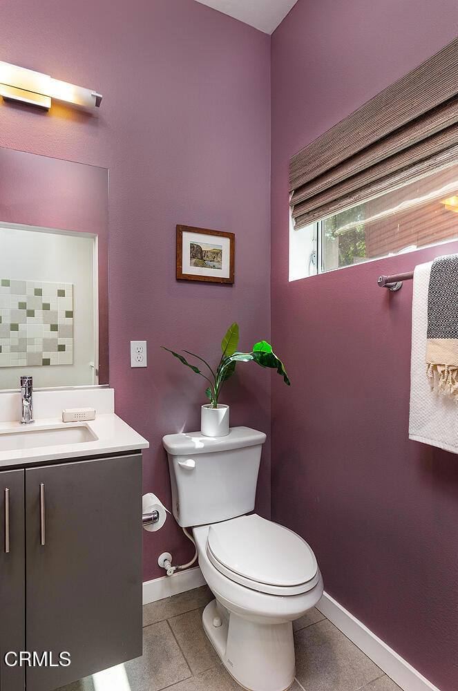 2222 Strata Lane Los Angeles, CA 90041 - Photo 20 of 31 a white toilet sitting next to a bathroom sink