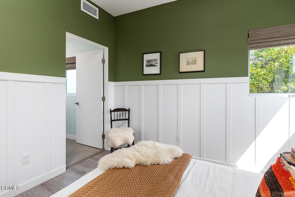 2222 Strata Lane Los Angeles, CA 90041 - Photo 22 of 31 a bedroom with a bed and a window
