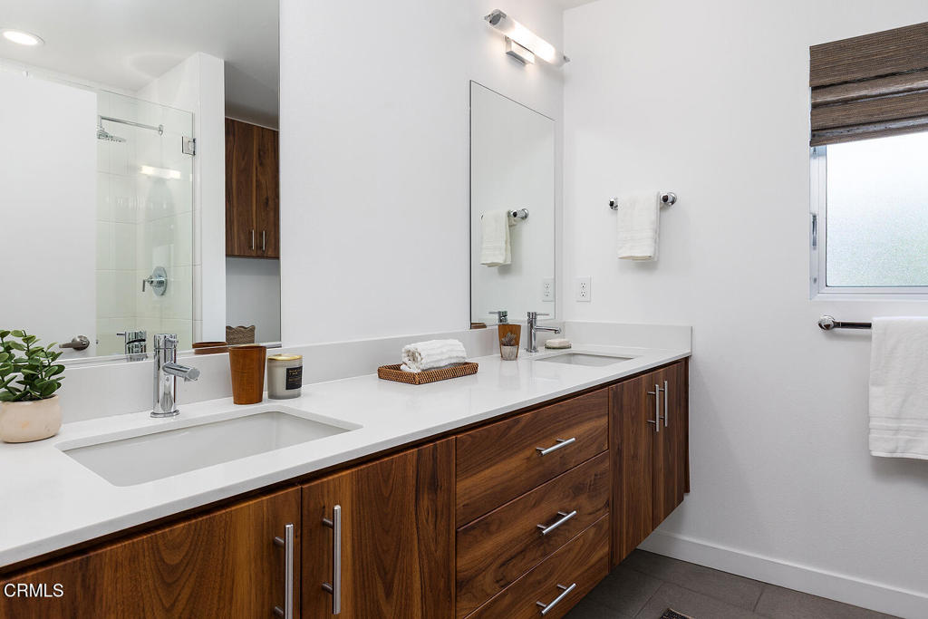 2222 Strata Lane Los Angeles, CA 90041 - Photo 26 of 31 a bathroom with a sink double vanity and a mirror