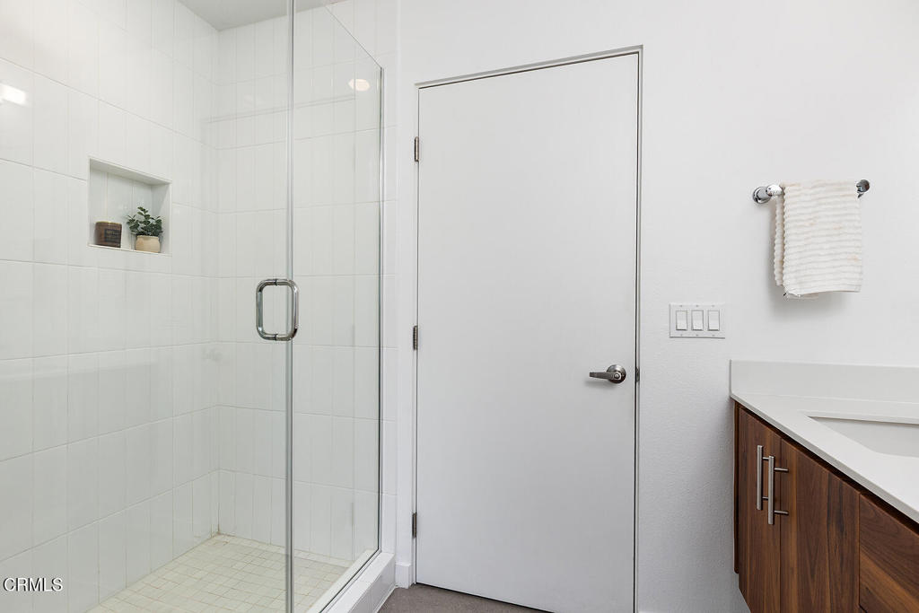 2222 Strata Lane Los Angeles, CA 90041 - Photo 27 of 31 a bathroom with a shower and a sink