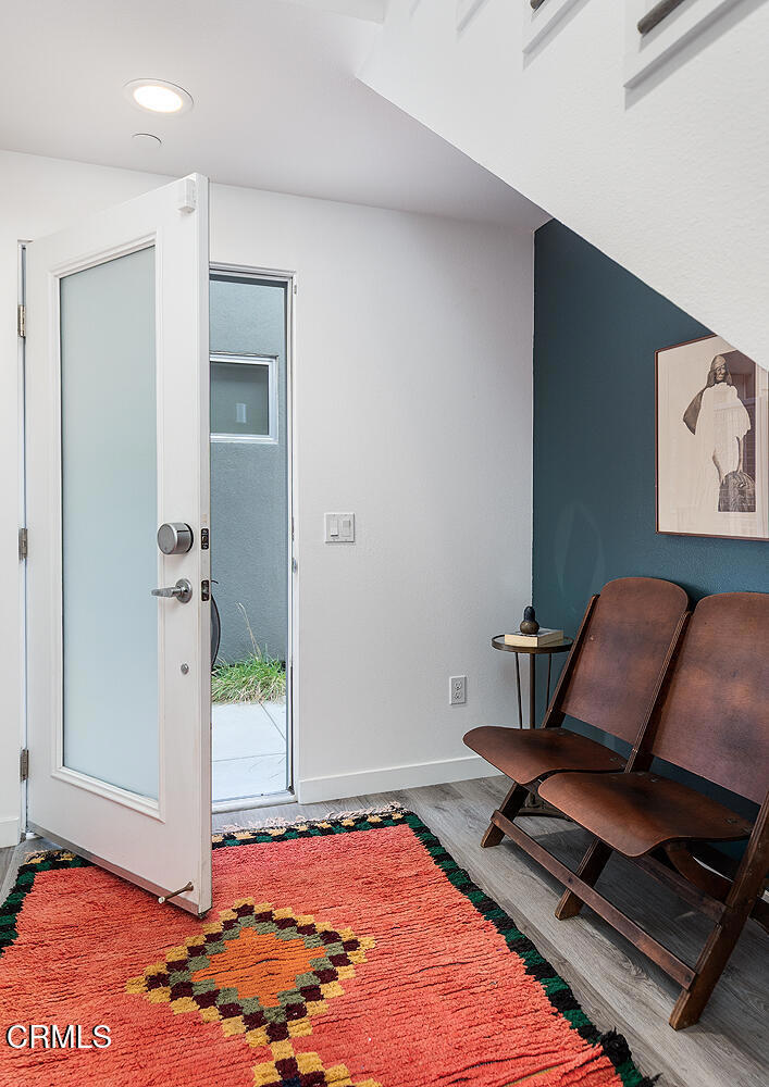 2222 Strata Lane Los Angeles, CA 90041 - Photo 5 of 31 a bedroom with furniture and a rug