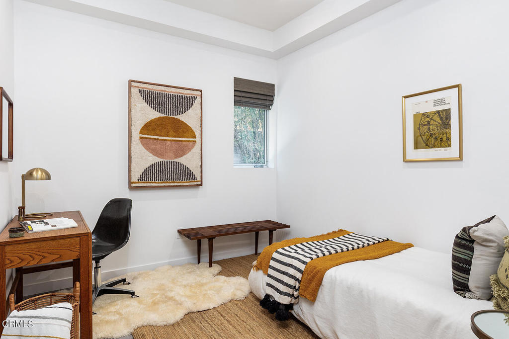 2222 Strata Lane Los Angeles, CA 90041 - Photo 6 of 31 a bedroom with a bed and a desk