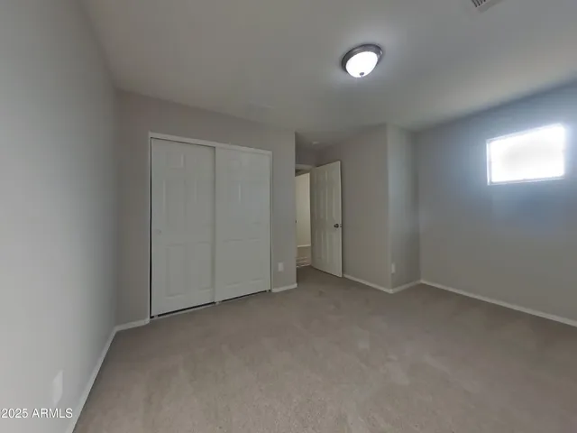 an empty room with window