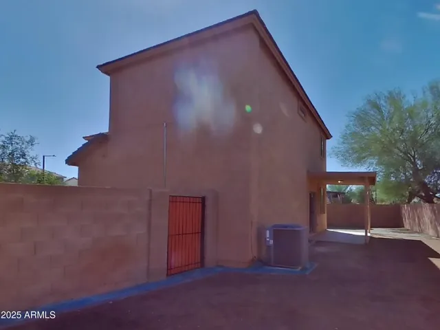 a front view of a house with garage