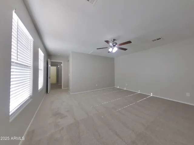 a kitchen with a refrigerator stove and microwave