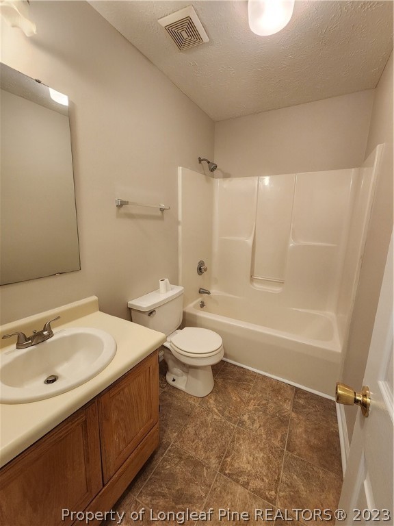 4324 Falls Drive Hope Mills, NC 28348 - Photo 7 of 10 a bathroom with a sink a toilet and a shower