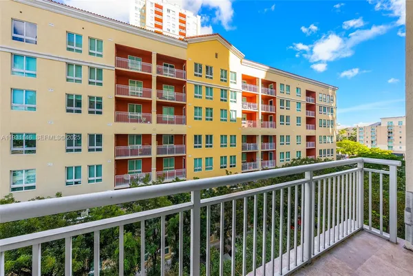 a view of a building from a balcony