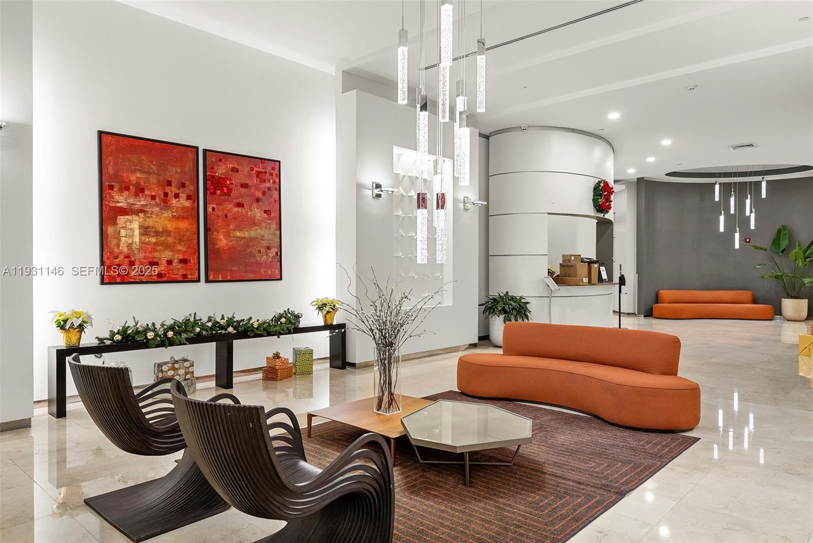 9066 Southwest 73rd Court, Unit 405 Miami, FL 33156 - Photo 25 of 32 a living room with furniture and a large window