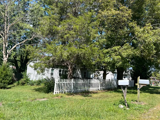 a garden view with a sitting area