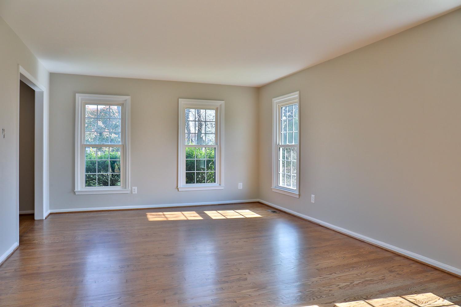 5423 Rilian Court Burke, VA 22015 - Photo 17 of 67 an empty room with wooden floor and windows