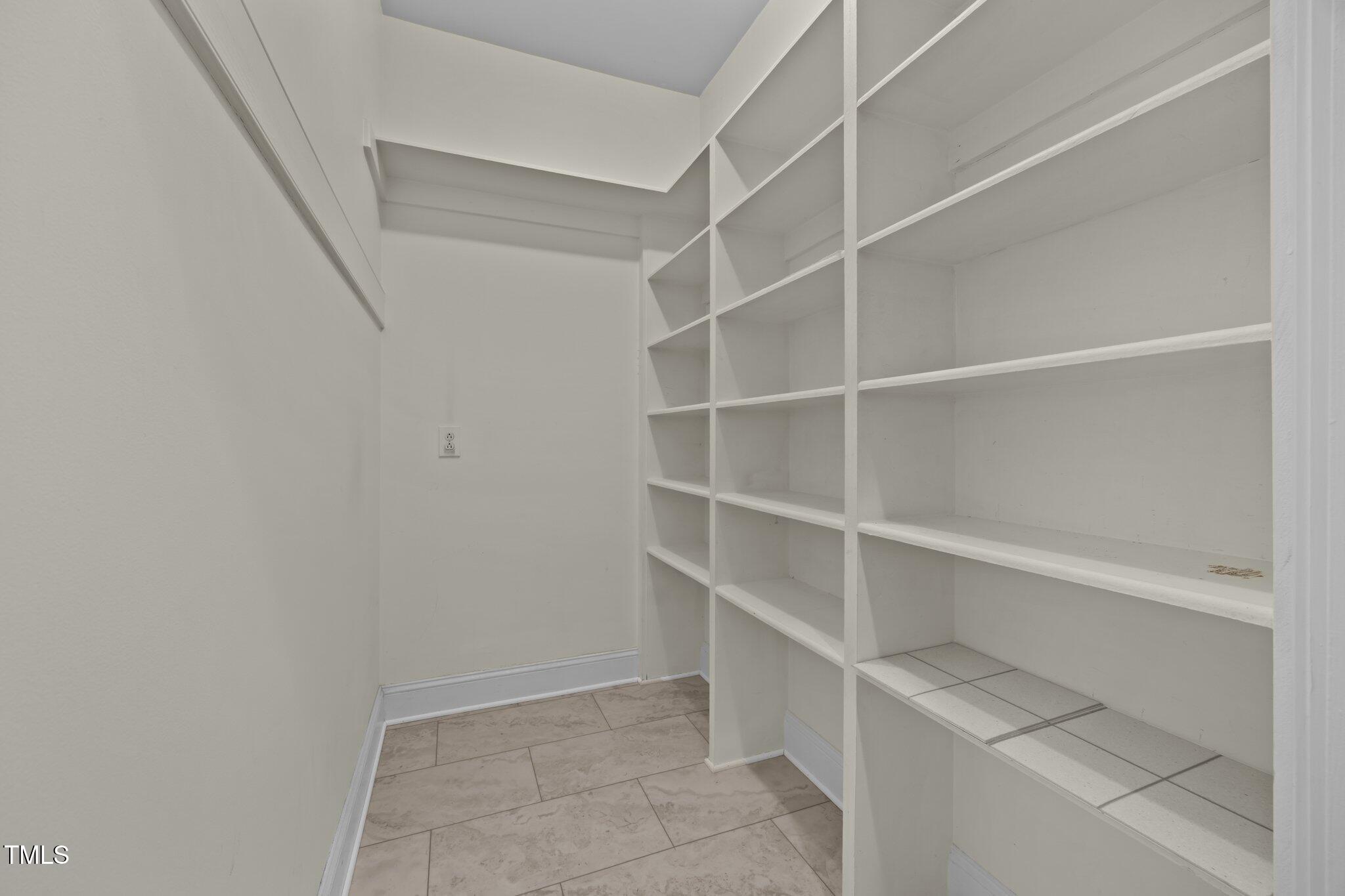 100 Edenburgh Road, Unit 202 Raleigh, NC 27608 - Photo 25 of 52 a view of an empty walk in closet