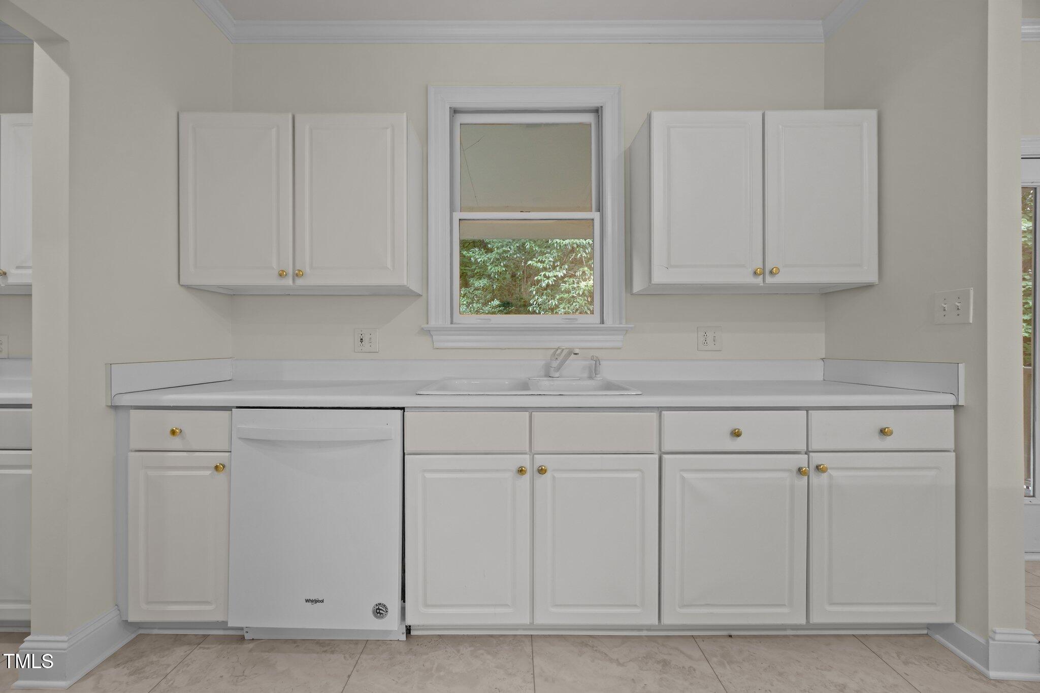 100 Edenburgh Road, Unit 202 Raleigh, NC 27608 - Photo 29 of 52 a kitchen with white cabinets