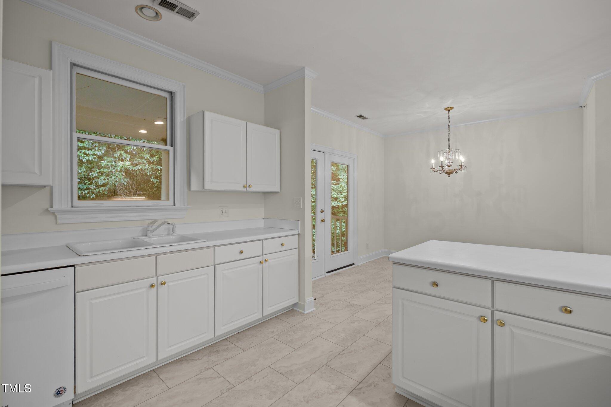 100 Edenburgh Road, Unit 202 Raleigh, NC 27608 - Photo 31 of 52 a bathroom with a sink and a mirror