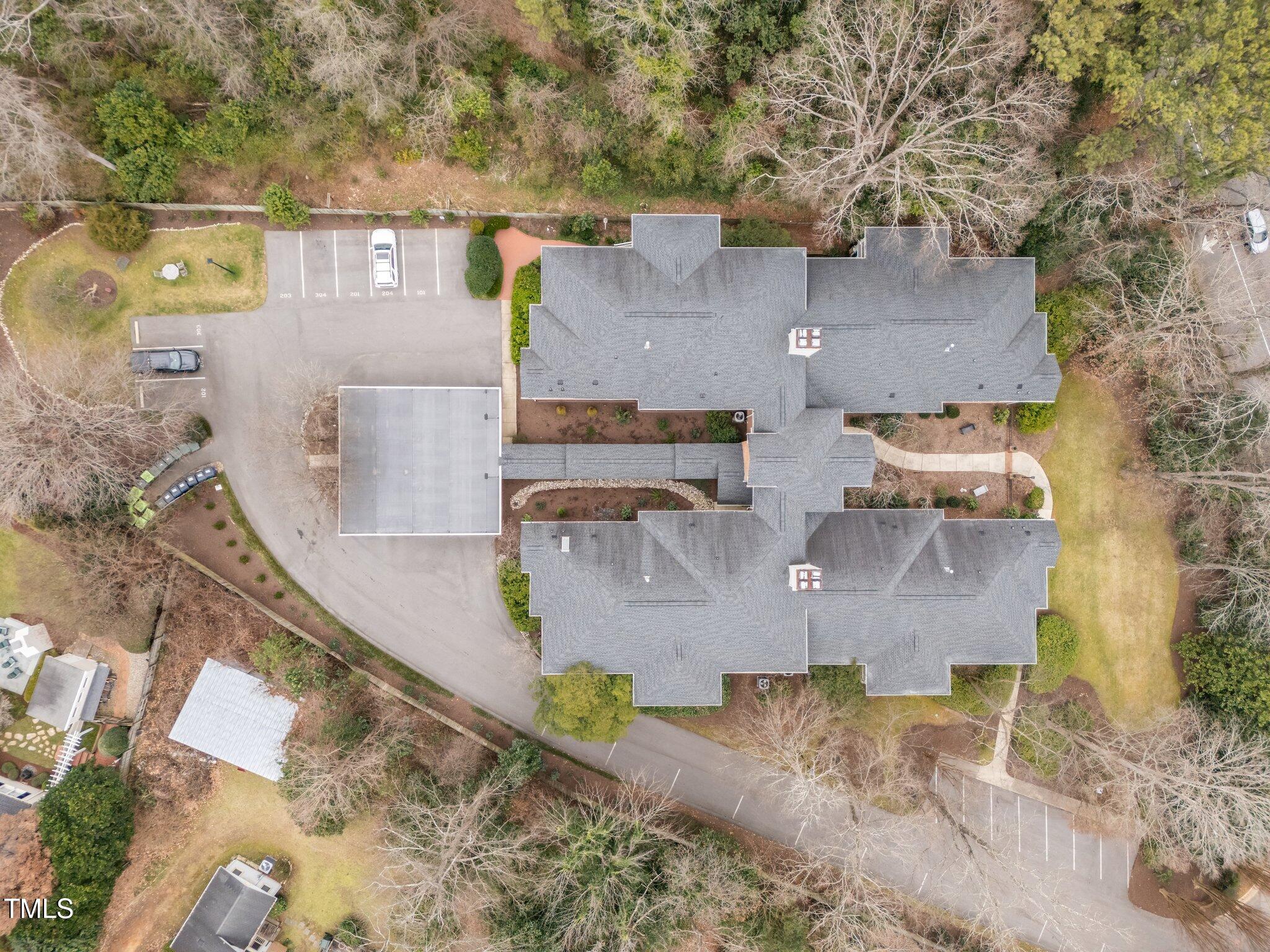 100 Edenburgh Road, Unit 202 Raleigh, NC 27608 - Photo 48 of 52 an aerial view of residential houses with outdoor space