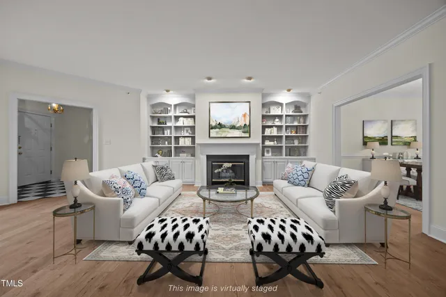 a view of a closet with wooden floor