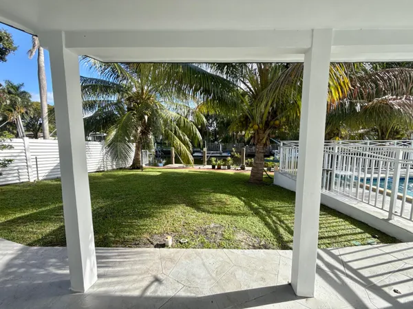 a view of a backyard with a garden