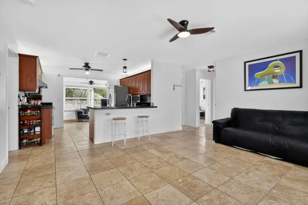 a living room with furniture and a window