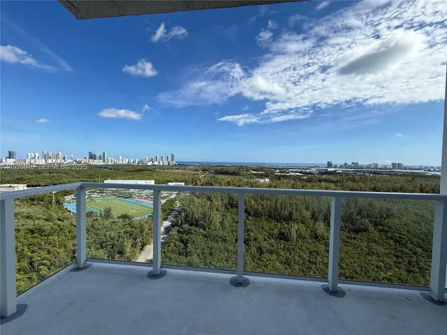 a view of a lake from a balcony