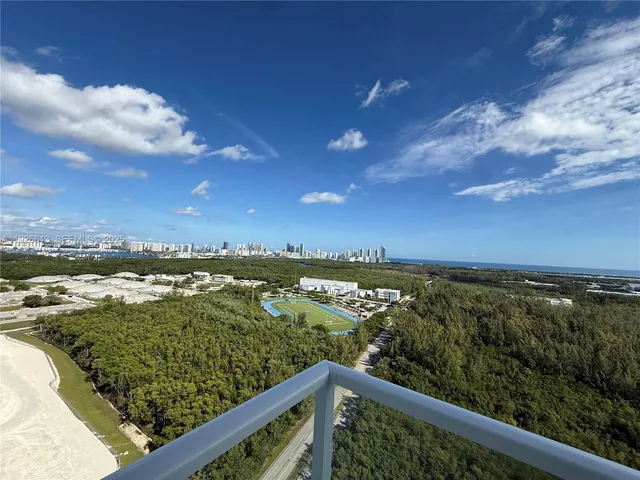 a view of a lake from a balcony