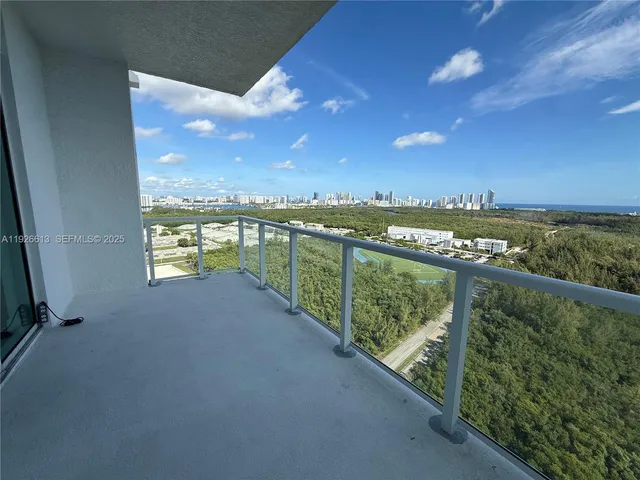 a view of balcony with outdoor space and mountain view in back