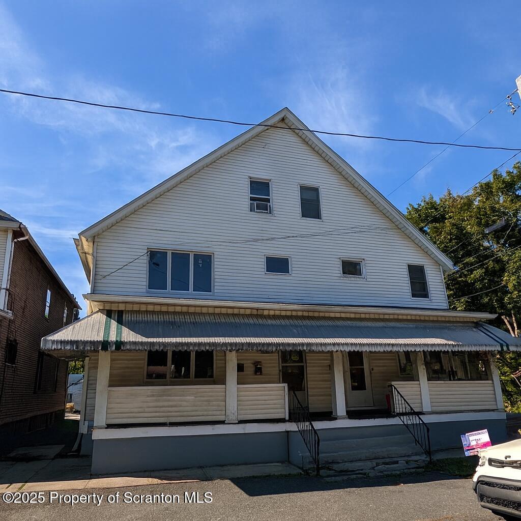 2133-2135 Jackson Street Scranton, PA 18504 - Photo 1 of 38 a view of a house with a garage