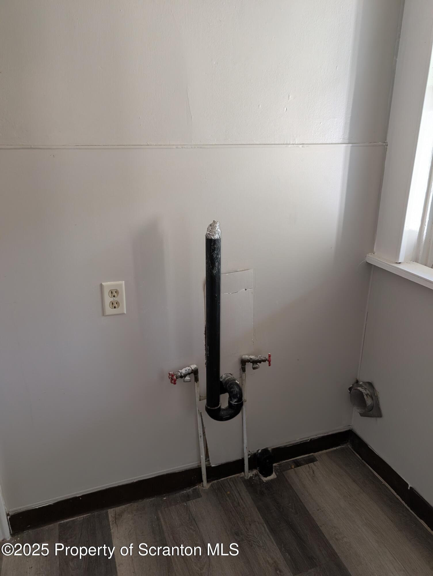 2133-2135 Jackson Street Scranton, PA 18504 - Photo 21 of 38 a view of a room with rack on the wall