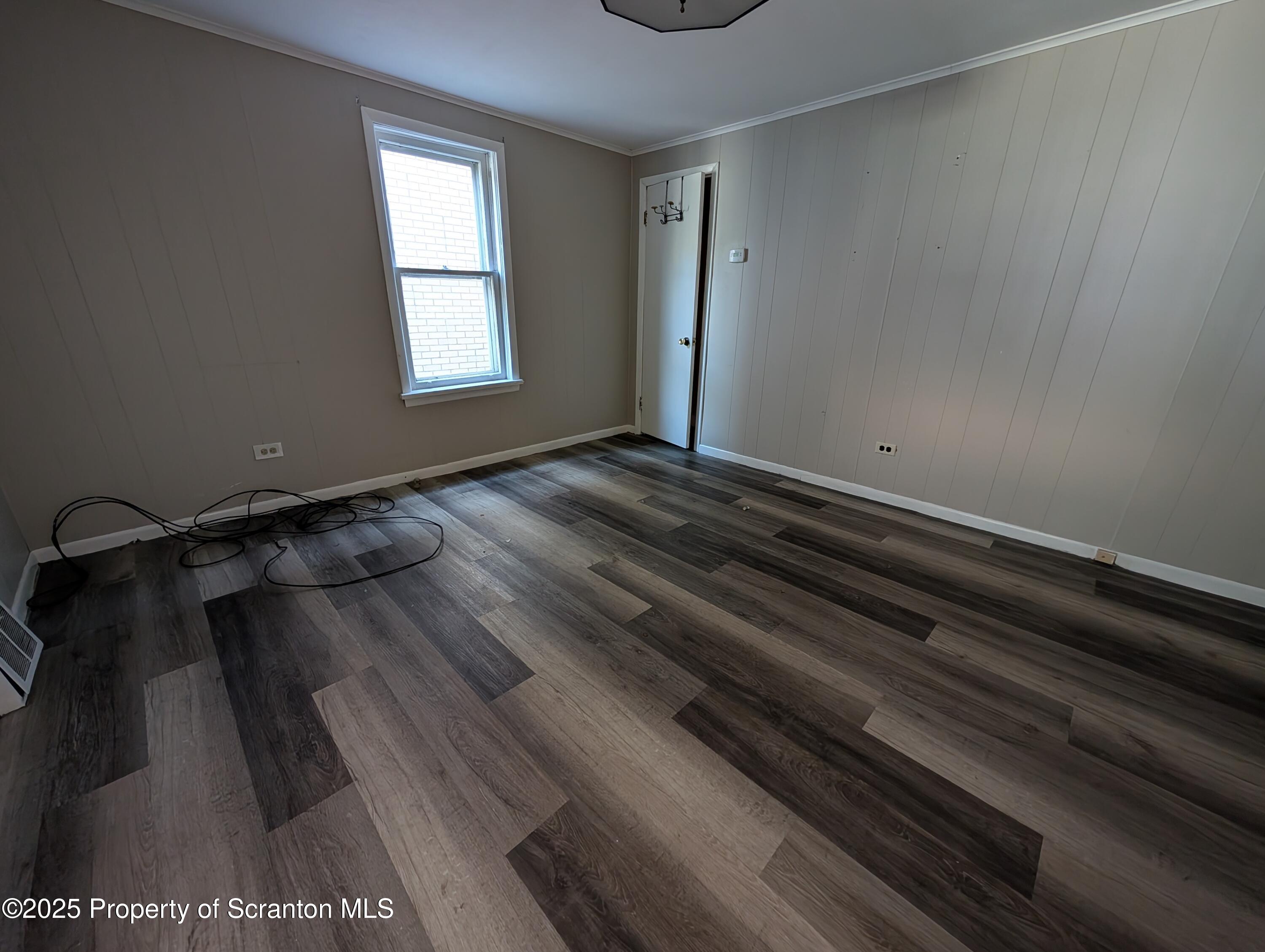 2133-2135 Jackson Street Scranton, PA 18504 - Photo 24 of 38 a view of a room with wooden floor