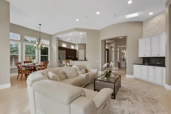 a dining room with furniture and window