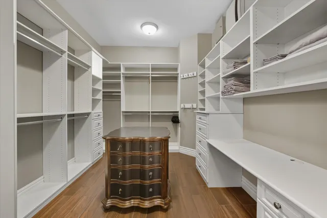 a bathroom with a sink toilet and a mirror