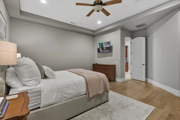 a bathroom with a granite countertop sink mirror and double