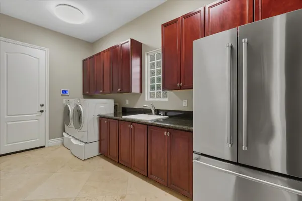 a spacious bedroom with a bed and a couch