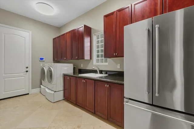 a spacious bedroom with a bed and a couch